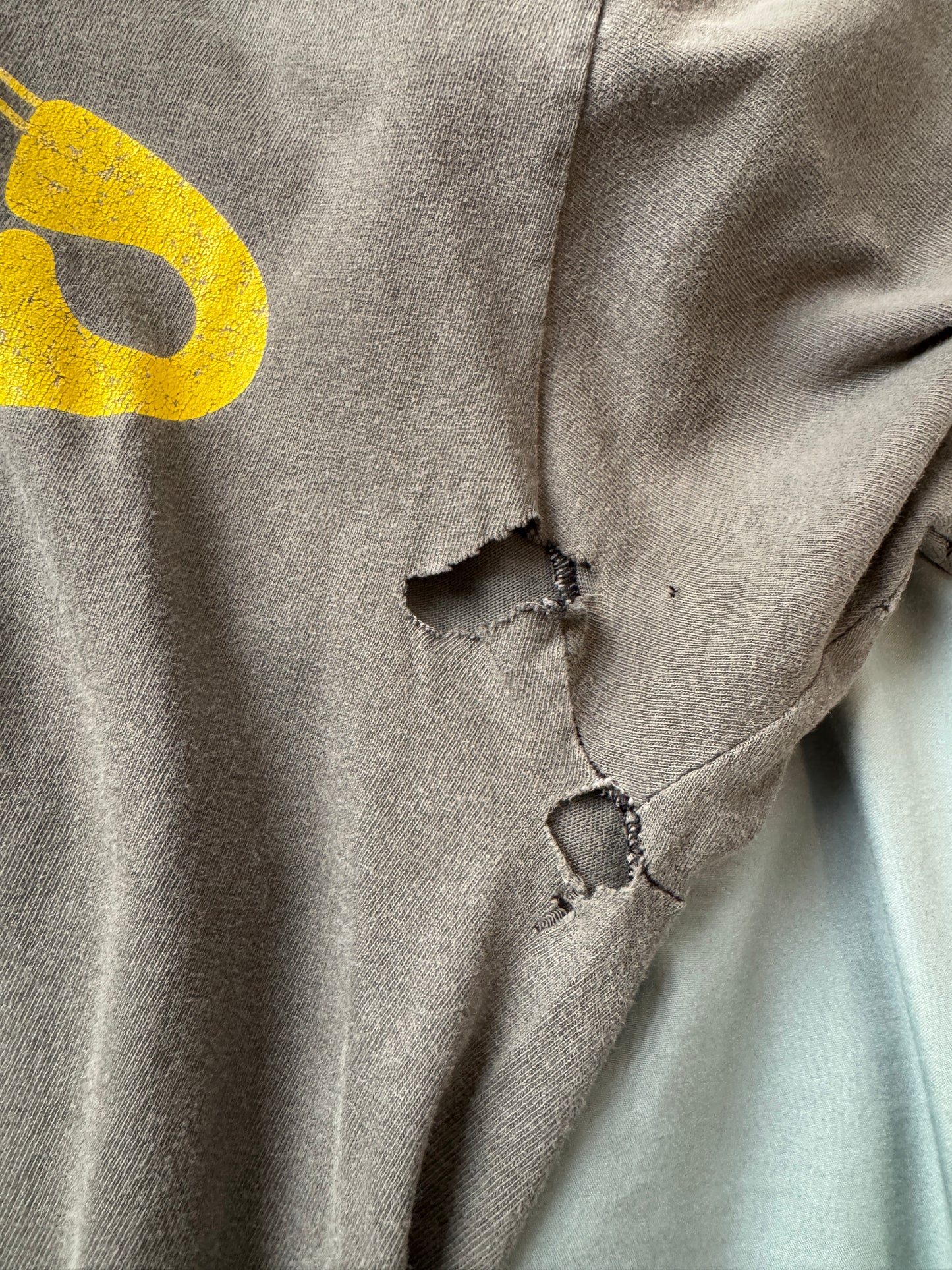 90s Wild Oats Smiley Faded Black Tee (L/XL)